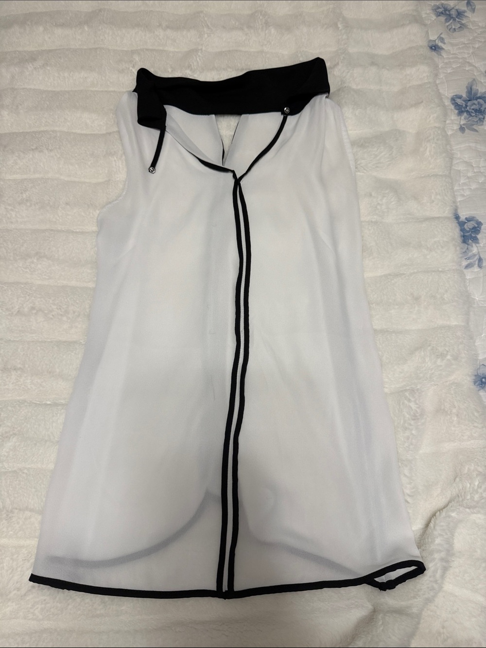 Sleeveless White Sheer Tie-Neck Top with Black Trim